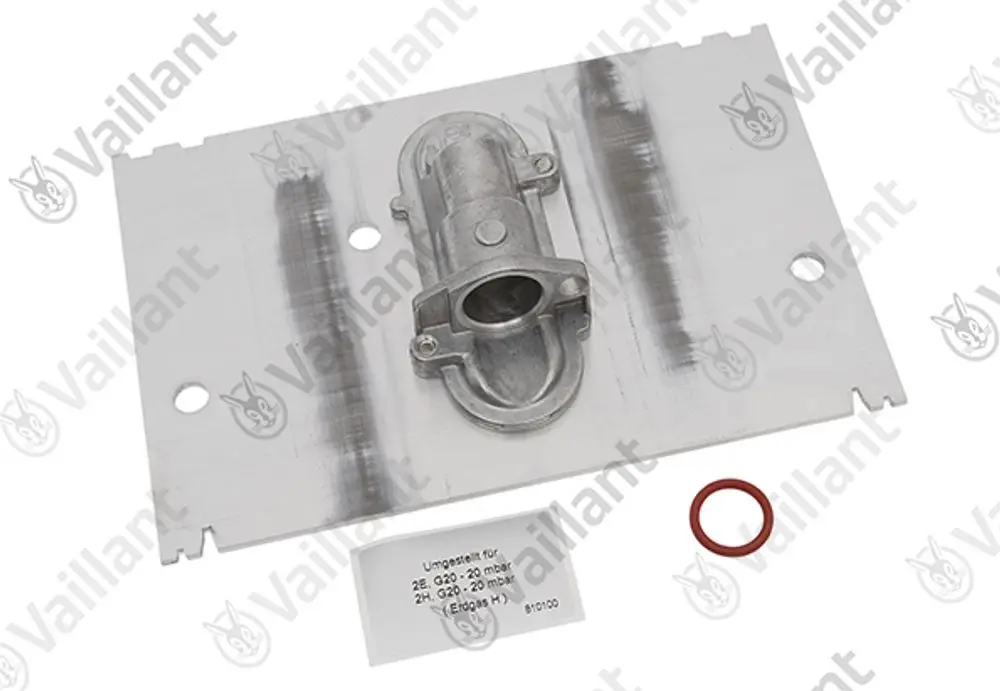 Vaillant Umstellsatz auf silberner Metallplatte mit einem integrierten Bauteil. Enthält einen roten Ring und eine beschriftete Papkarte.